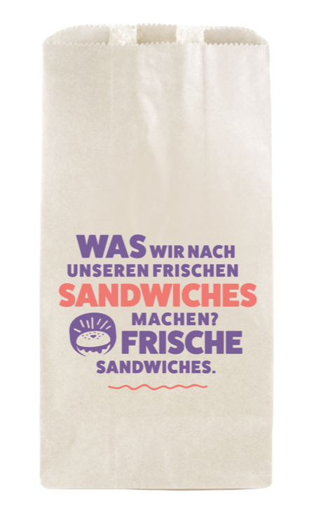 Tüte von Campus Suite mit der Aufschrift "Was wir nach unseren frischen Sandwiches machen? Frische Sandwiches."