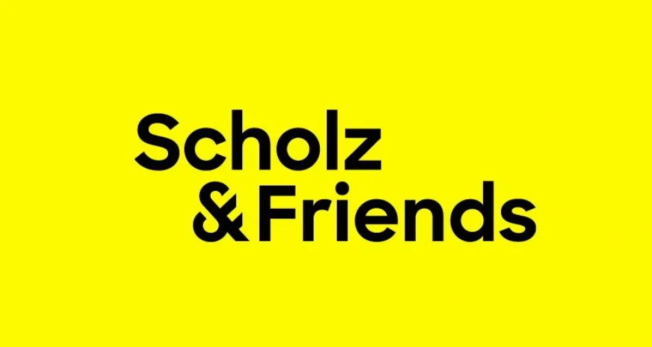 Logo von Scholz & Friends auf leuchtend gelbem Hintergrund.